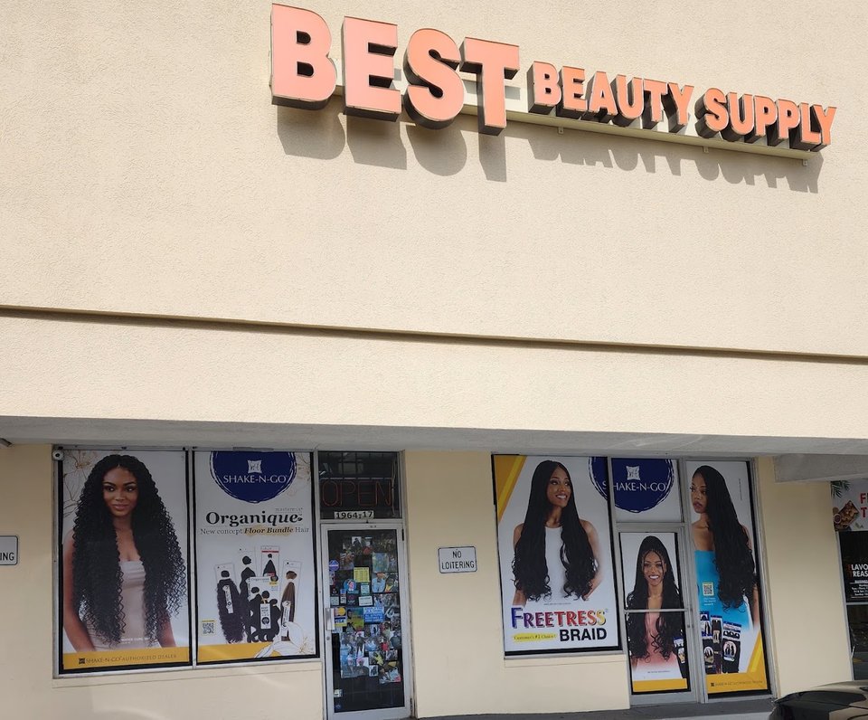 A beauty supply aisle with wigs and hair extensions.
