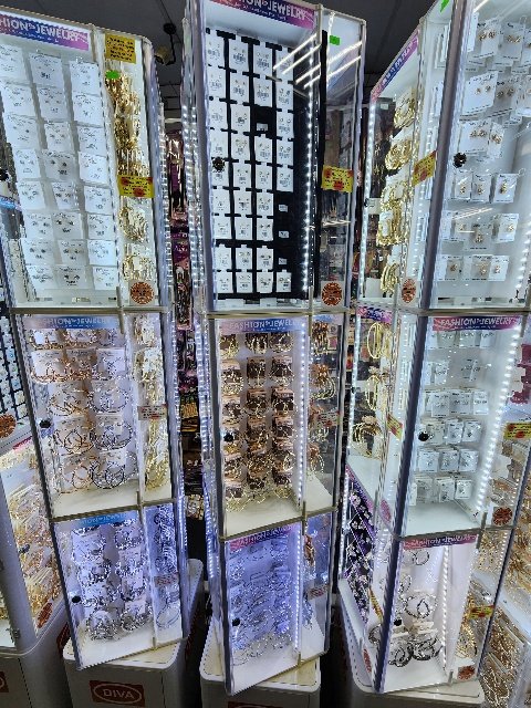 A beauty supply aisle with wigs and hair extensions.