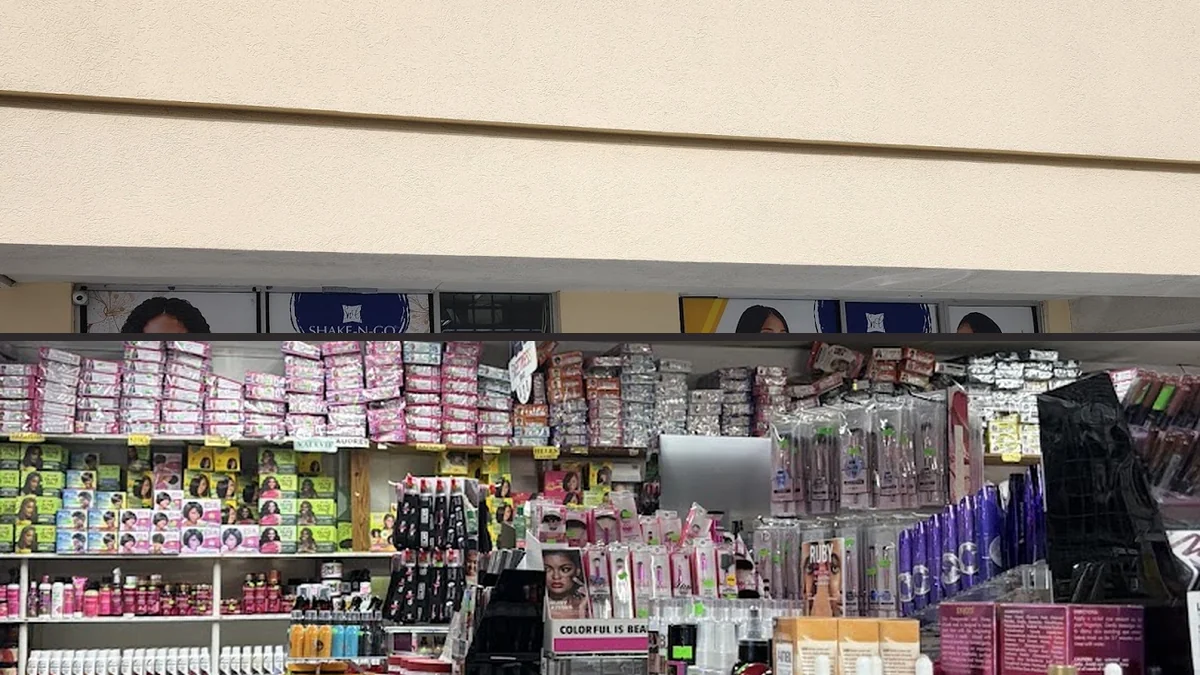 A beauty supply aisle with wigs and hair extensions.